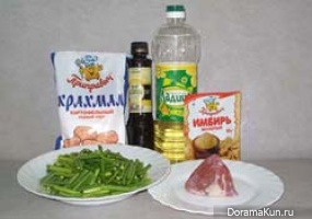 Shoots of garlic with meat